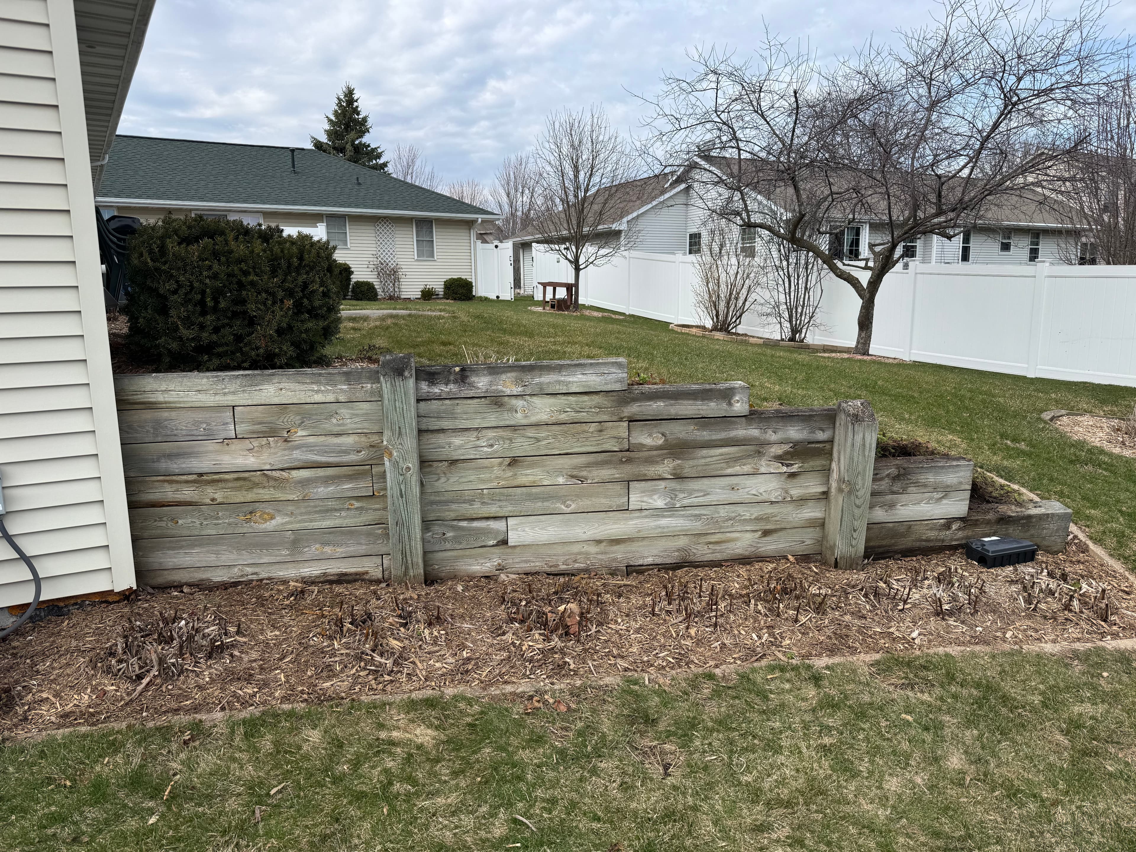 Project Old Timber Retaining Wall Replaced with Solid Stone image