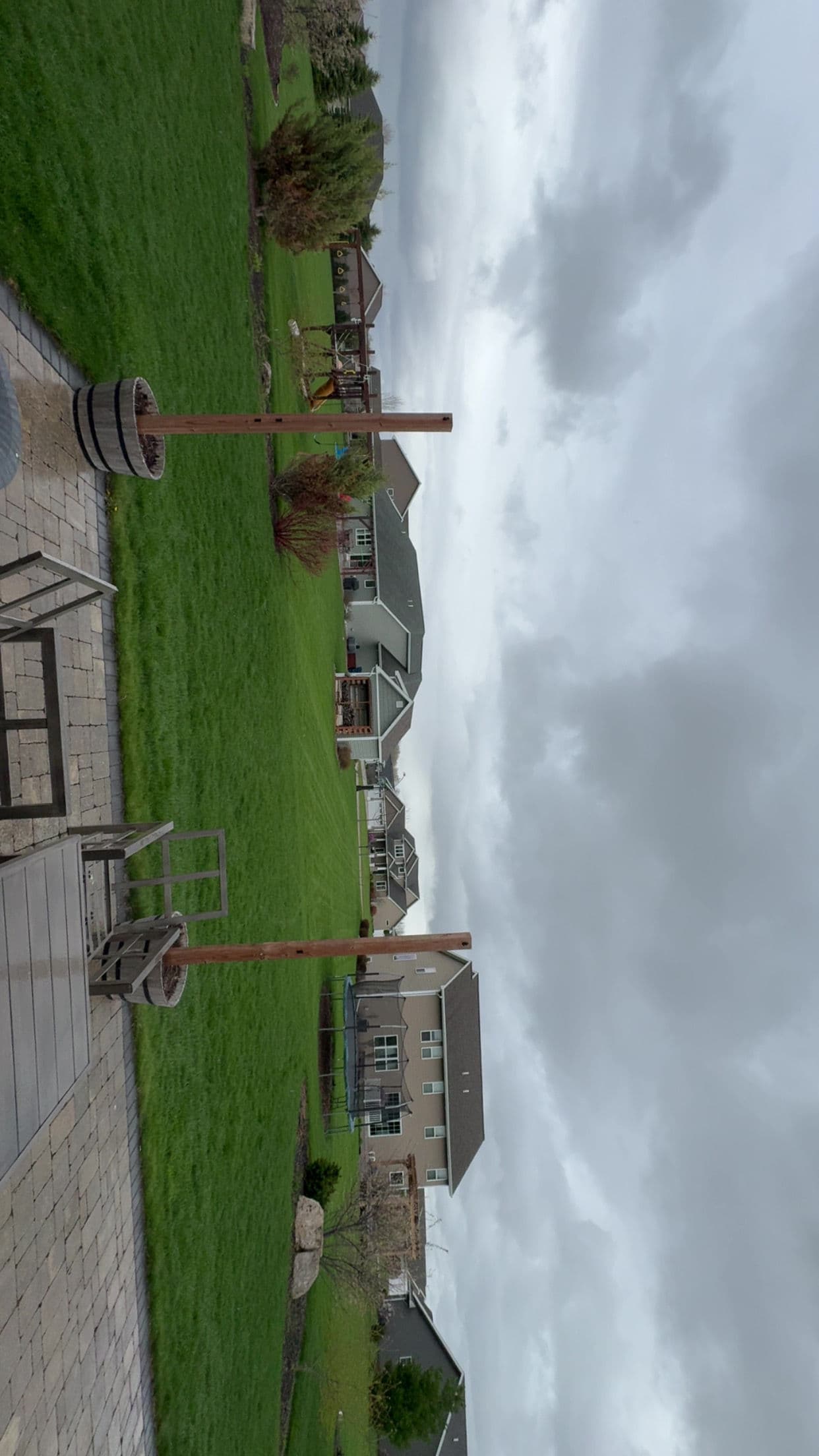 Gallery photos for Rock Beds and Arborvitaes Replace Worn Mulch in This Backyard: Image #2